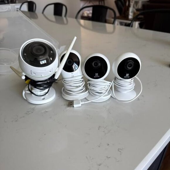 Ezviz indoor cameras (3) and 1 outdoor camera